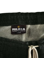 Milbea fleece pants interior shot of the size label. 